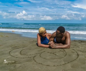 A couple enjoying themselves on the beach at Camp-Louise beach 